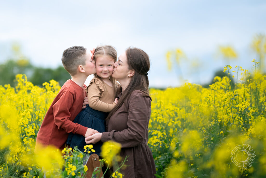 A family session in a rapeseed field